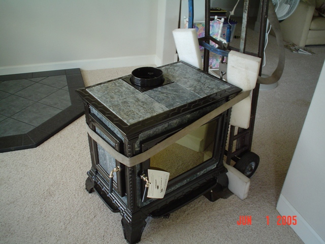 The stove being moved into place, only weighed 450lbs!!