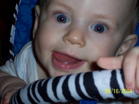 See the hint of teeth?