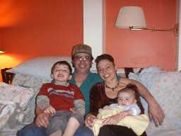 Jon Michael, Mike, Lisa, & Jesse  - Christmas 2002