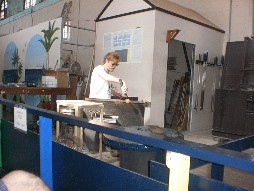 Shaping the figurine.