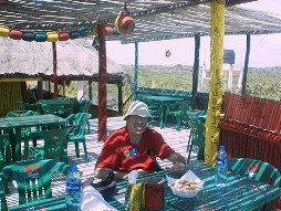 Ernie eating at Rastas Raggae Bar & Grill