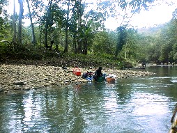 Local woman doing laundry in the river.
