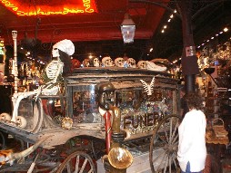 Skeleton driven horse-drawn hearse at the Jazz Funeral.