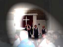 Ernie waiting for Dale to enter the church