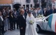 outside the wedding door...