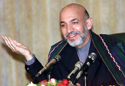 Afghanistan's interim leader Hamid Karzai called February 11, 2002 for more international peacekeepers to protect his fragile government from the challenges from tribal leaders. Karzai is seen during a news conference with Pakistan President General Pervez Musharraf in Islamabad on Feb. 8. 