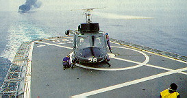 A Hellenic Aegean Hawk lands on a Hellenic Frigate