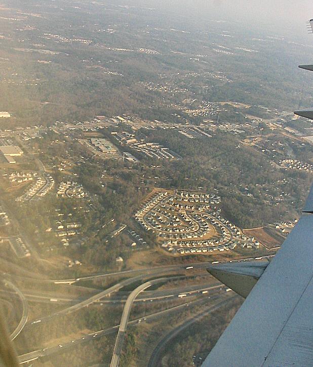 Taking off from Atlanta's Hartsfield-Jackson Airport, I caught this shot of the green countryside around the city.  Little did we know this view would change in just three days.  By the way, we JUST made the flight out of Atlanta.  Had it taken off on time, we'd have been hoofing it Miami.