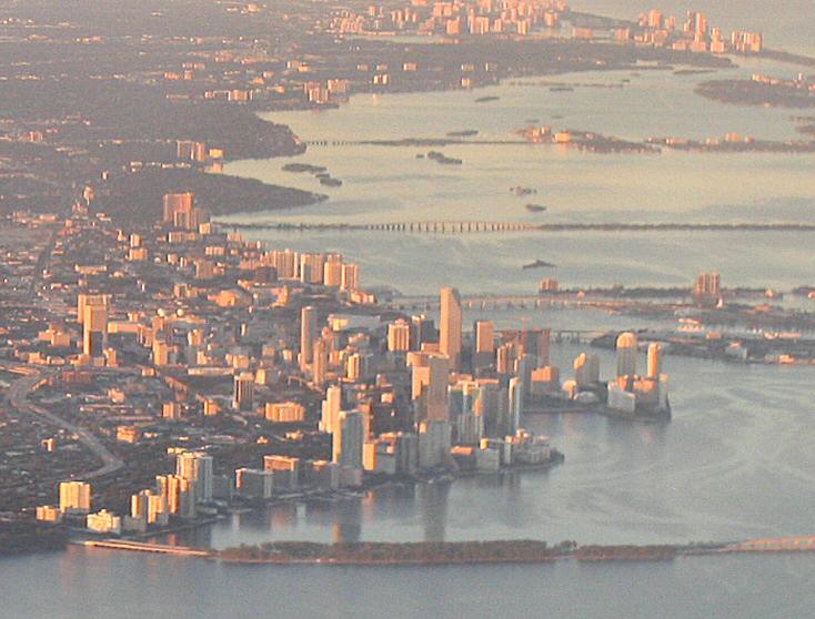 The Miami waterfront lit from the setting sun on our approach.