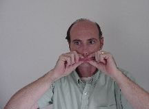 Perfrom a trumpeting sound in this position.