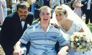 Ben with his cousin Kylie and her husband Dan - 12 months after the accident
