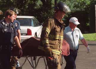 Collateral Fire Damage - Victim on Stretcher
