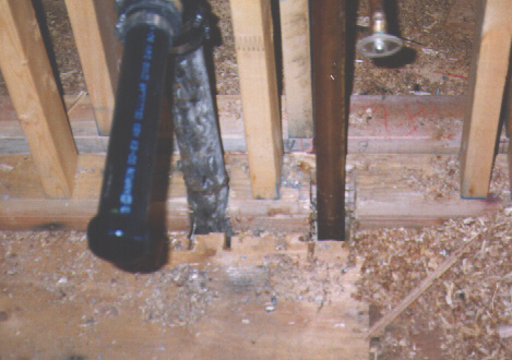 Timber Floor Through-Penetration - cut by Chainsaw
