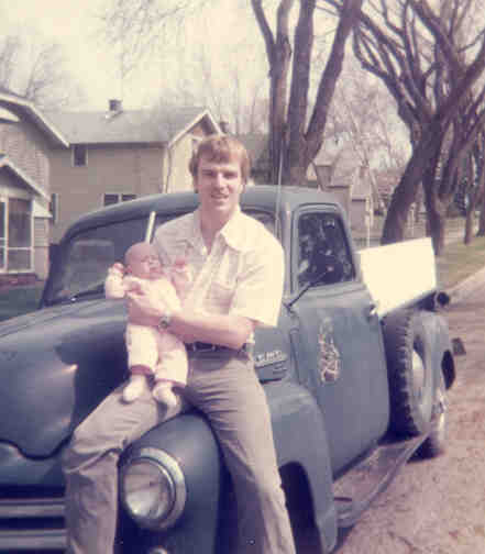 1950 GMC pickup, I had this for a couple of years in 1976-1978.&nbsp; Spring 1977 in Fergus Falls outside our apartment with baby Liz. 