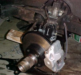 Wheel hub and brake caliper back in position.