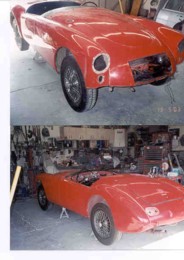 Left front fender ding, car red for sanding.