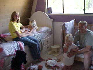 Changing clothes on Sunday, Aug 31, 2003.&nbsp; Carrie's bedroom, riverhouse.