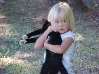 Ali and Mr. Wiggles, he returned from the neighbors this weekend.&nbsp; Labor Day 2003