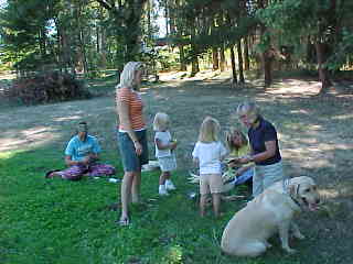 Shucking corn, Mahana watches, Labor Day 2003, Riverhouse