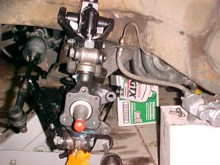 Left hand king pin/swivel axle in place.