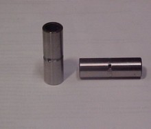 Distance pin with grease groove and hole drilled, after the style of Tom Bedenbaugh