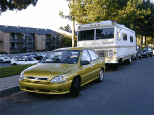Here is my '02 Kio Rio & '74 Executive RV