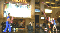 Here are some entertainers juggling large balls.