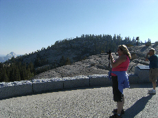 And that is Half dome way to the left of this picture, Candace taking picture of it.