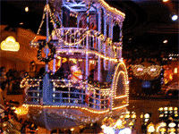 Here is the Show Boat coming by with entertainers throwing beads to the crowd.