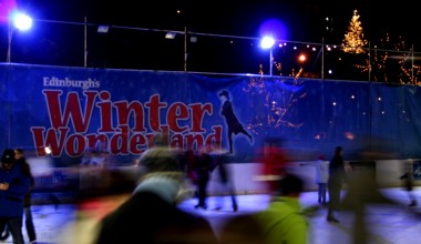Ice-skating in Princes Street Gardens, with the Christmas tree in the background.