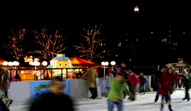Ice-skating in Princes Street Gardens, with the city star overhead.