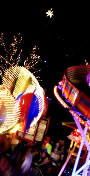 The city star above the rides in Princes Street Gardens.