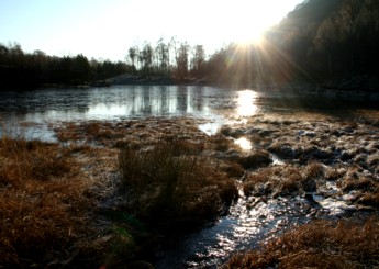 A frozen-over loch in the mountains above Aviemore.