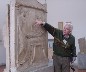 Our guide Nikos with a grave marker