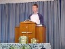 Brandon speaking at church