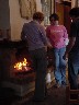 Crystal, Sara, and Matt enjoying the fire
