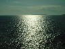 The waters of the Saronic gulf reflecting the rays of the sun