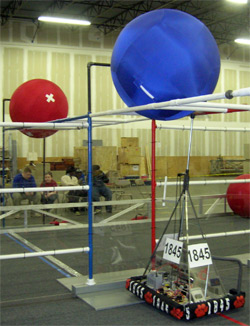 Our Robot retrieving a ball from the Overpass.