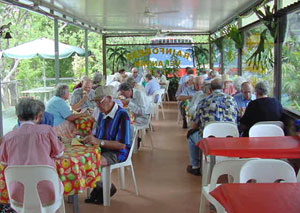 Tour group enjoying lunch at the Rainforest Cafe at Crystal Creek Miniatures