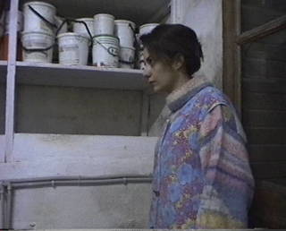 MEZZA FIGURA
(tratto dal cortometraggio 'Flam,l'inganno'di Daniela Sgambelluri,nella scena Oriana Mariotti)