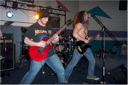 Incaged in concert.