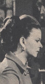 Liz Collins (Joan Bennett)