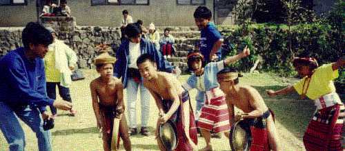 Participating in a tribal dance...