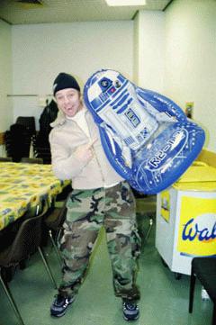 "LOOK!!!! LOOK WHAT I FOUND!!!! It's an infatlatable R2-D2!!" 