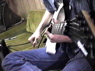 closeup of Steve's guitar
