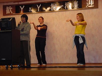 julie and em provide kungfu disco backup dancing at the y&y annual niigata ski trip, jan2003
