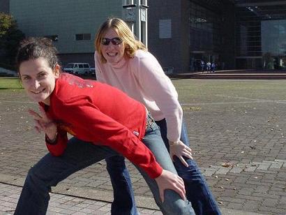 orla and em practicing cheerleading moves for the Saitama Jets FC *