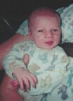 Happy lil Christopher cause Nanny's holdin him