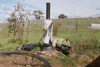 Rocket wood-fired water heater, simple solar water heater, 
and drum water heater
