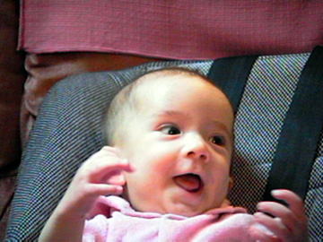 Devin sitting in his car seat